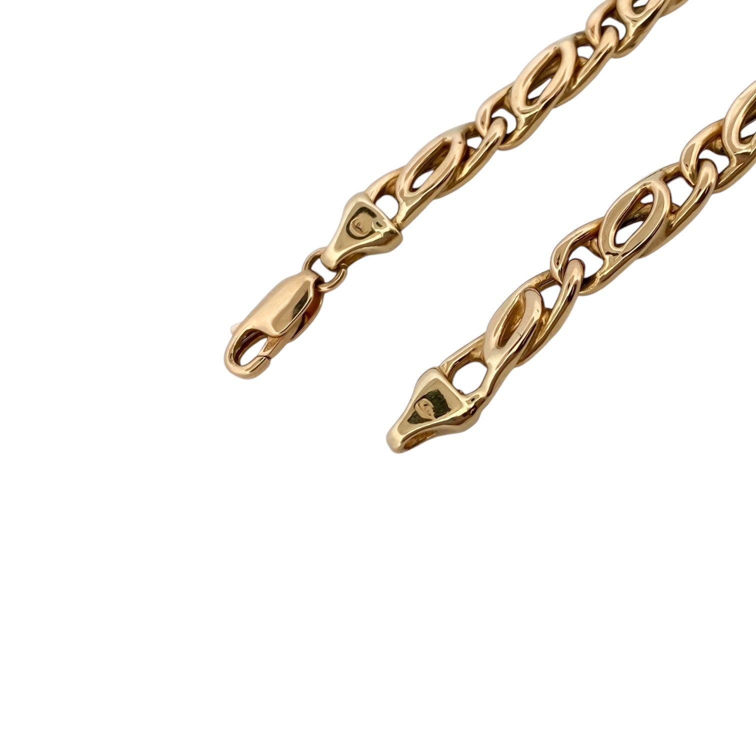 Comprar cadena realizada en oro amarillo de 18kt con eslabones ojo de tigre y cierre tipo mosquetón. Joyas restauradas. Cadenas de oro de 18kt. Joyería Ian'Or.