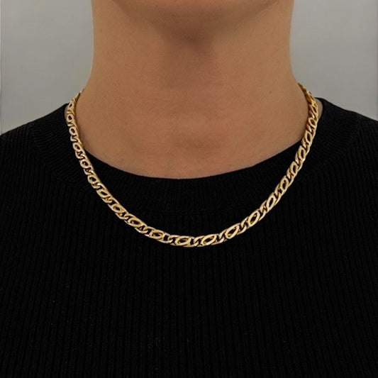 Comprar cadena realizada en oro amarillo de 18kt con eslabones ojo de tigre y cierre tipo mosquetón. Joyas restauradas. Cadenas de oro de 18kt. Joyería Ian'Or.