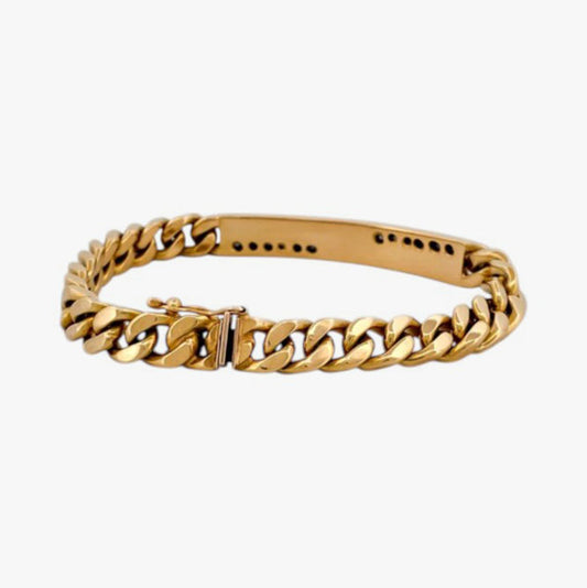 Comprar pulsera oro amarillo de 18kt con cadena tipo cubana y una placa central con diamantes. Joyas al mejor precio en Barcelona. Ian'Or.
