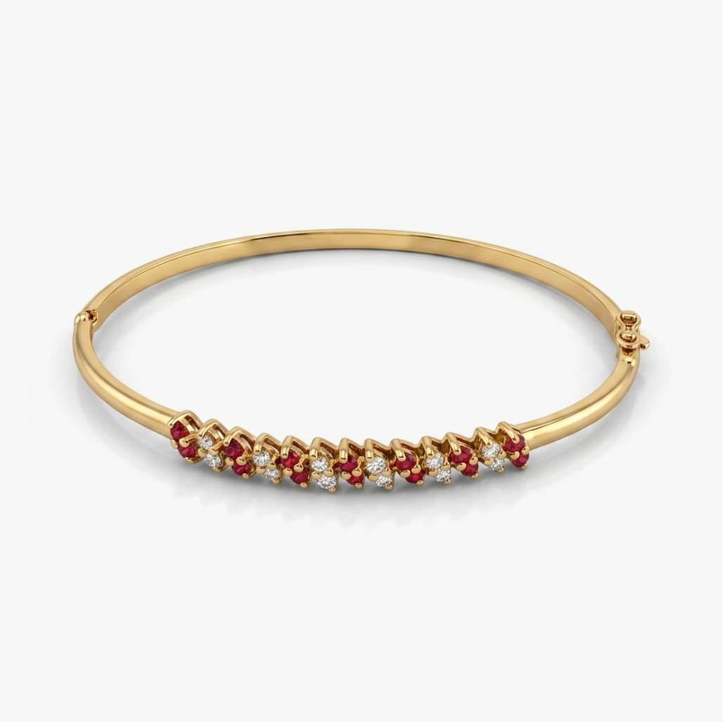 Comprar pulsera esclava realizada en oro amarillo de 18kt con diamantes y rubíes. Cierre de cajón con un brazo de seguridad. Joyas restauradas. Joyería Ian'Or.