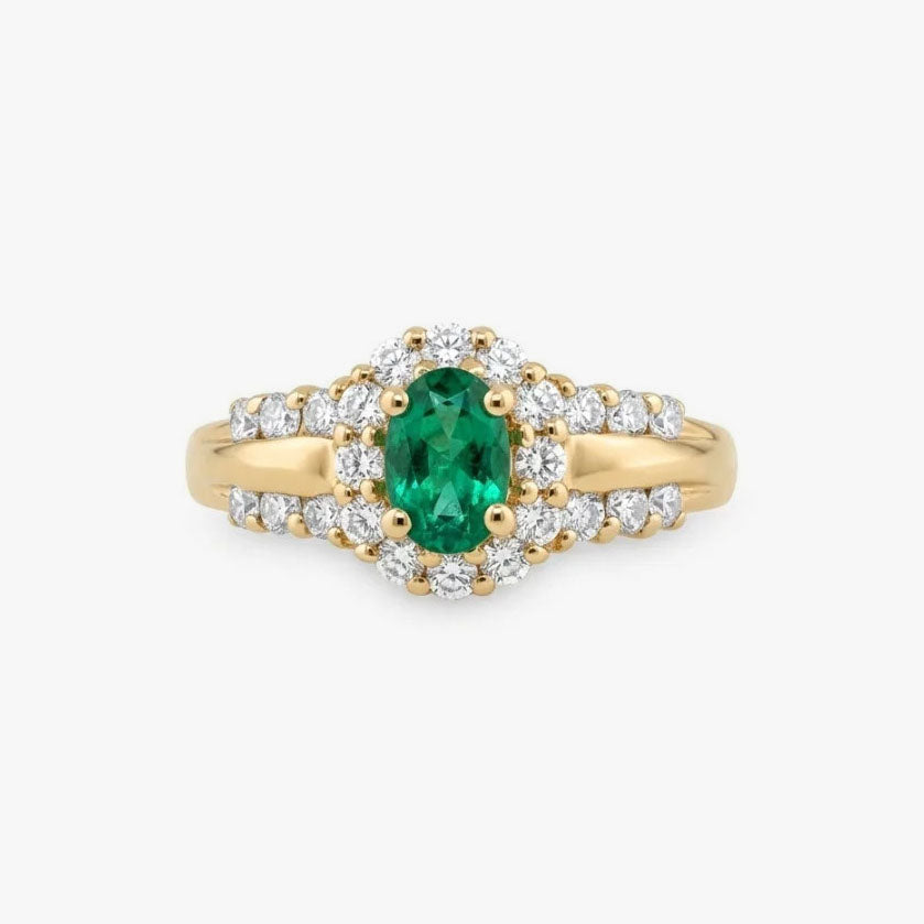Comprar anillo realizado en oro amarillo de 18kt con una esmeralda central y rosetón de diamantes alrededor y en los brazos. Joyas segunda mano. Joyería Ian'Or.