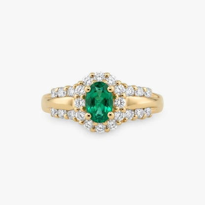 Comprar anillo realizado en oro amarillo de 18kt con una esmeralda central y rosetón de diamantes alrededor y en los brazos. Joyas segunda mano. Joyería Ian'Or.