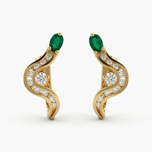 Comprar pendientes realizados en oro amarillo de 18kt con 9 diamantes en carril, uno con grapa y una esmeralda en cada pendiente. Pendientes estilo trepador.