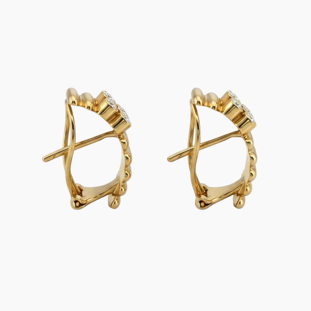 Comprar pendientes de oro amarillo de 18kt con 6 diamantes en cada pendiente. Estos preciosos pendientes disponen de cierre tipo omega. Joyas restauradas. Envío gratis a toda la península. Joyería Ian'Or.