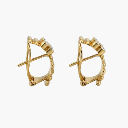 Comprar pendientes de oro amarillo de 18kt con 6 diamantes en cada pendiente. Estos preciosos pendientes disponen de cierre tipo omega. Joyas restauradas. Envío gratis a toda la península. Joyería Ian'Or.