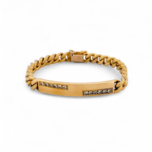 Comprar pulsera oro amarillo de 18kt con cadena tipo cubana y una placa central con diamantes. Joyas al mejor precio en Barcelona. Ian'Or.