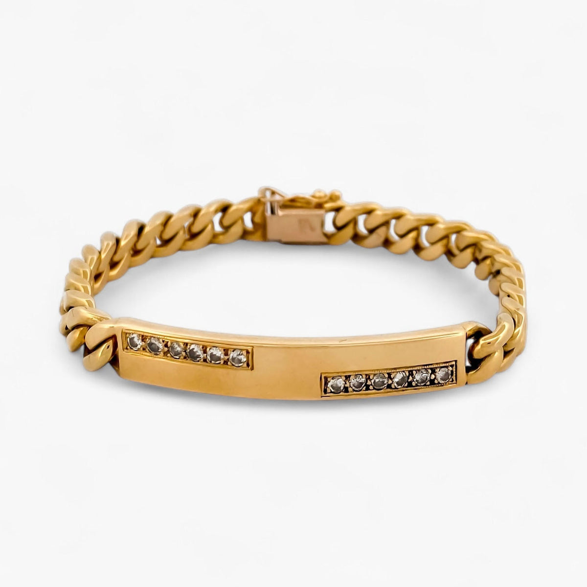 Comprar pulsera oro amarillo de 18kt con cadena tipo cubana y una placa central con diamantes. Joyas al mejor precio en Barcelona. Ian'Or.