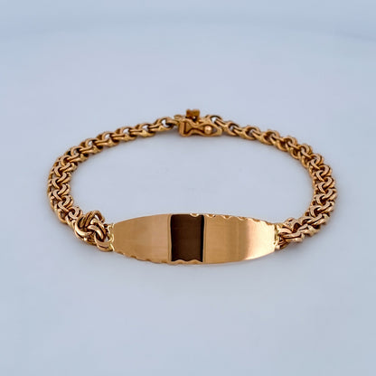 Pulsera no me olvides de oro amarillo de 18kt y placa para grabar. Esta pulsera dispone de cierre de cajón y brazo de seguridad. Joyería Ian'Or. Envío gratis.
