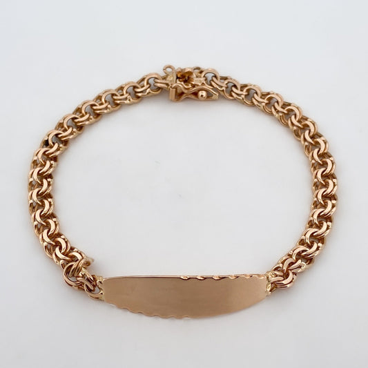 Pulsera no me olvides de oro amarillo de 18kt y placa para grabar. Esta pulsera dispone de cierre de cajón y brazo de seguridad. Joyería Ian'Or. Envío gratis.