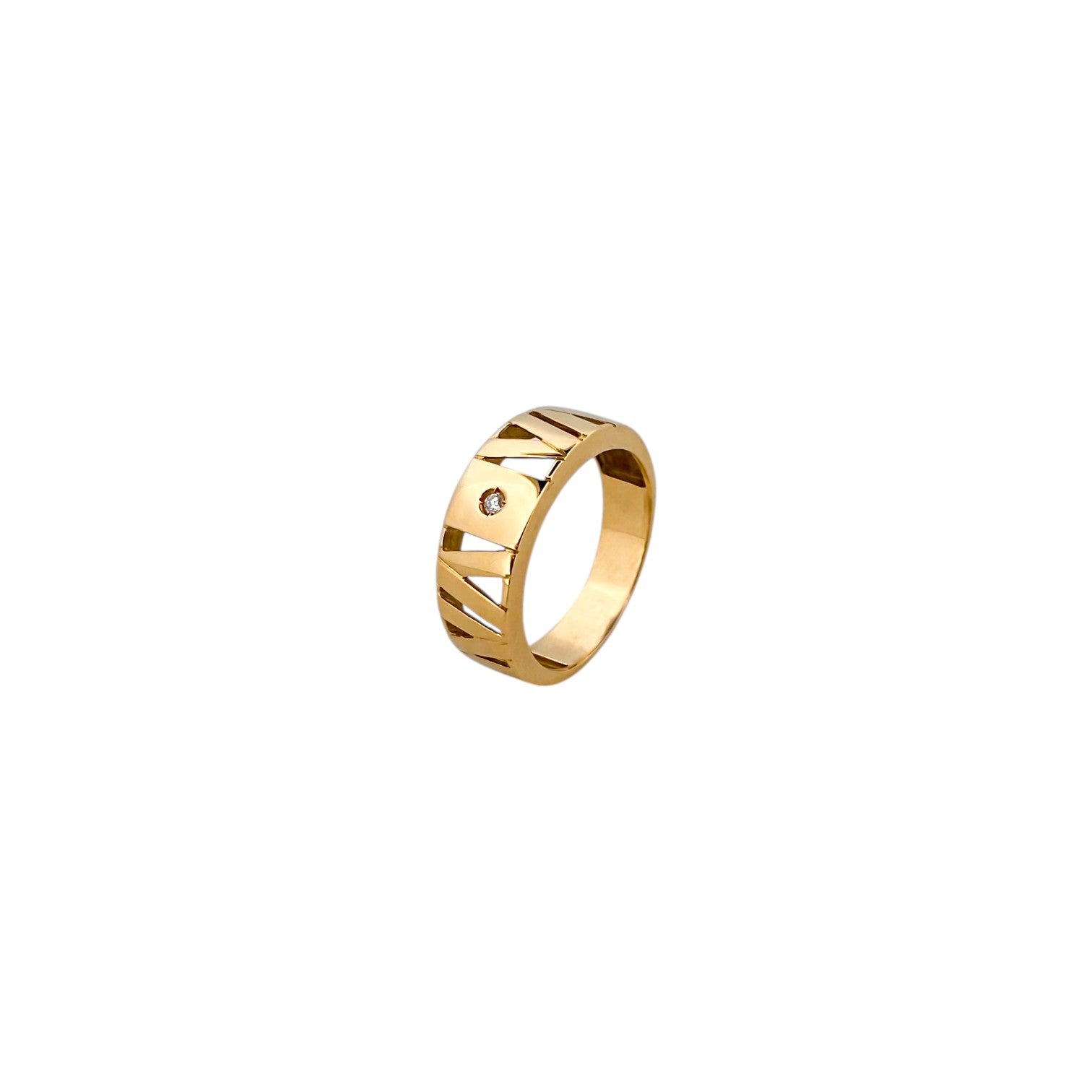 Comprar anillo calado realizado en oro amarillo de 18kt con un diamante talla brillante en la parte central. Joyas segunda mano. Joyería Ian'Or. Envío gratis.