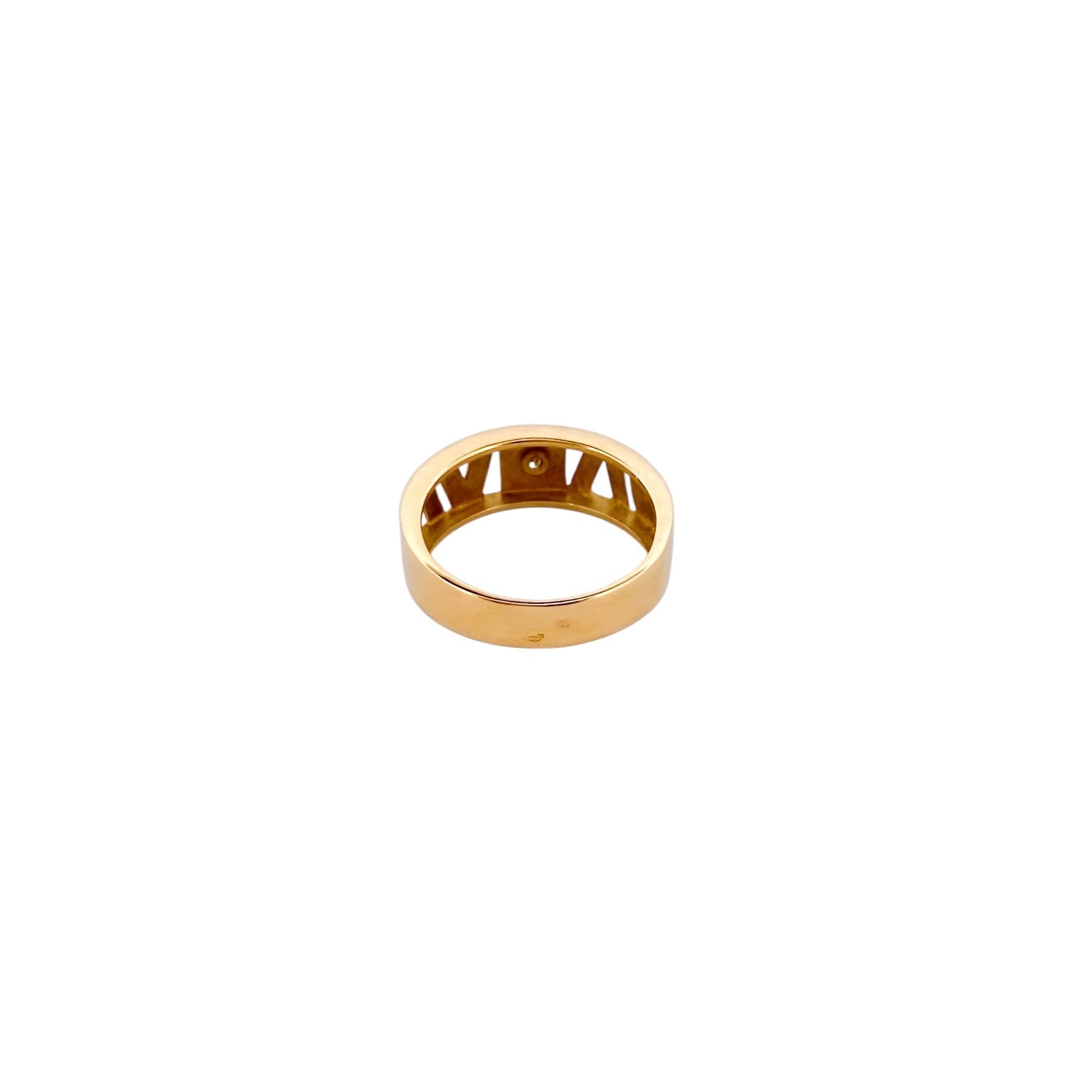 Comprar anillo calado realizado en oro amarillo de 18kt con un diamante talla brillante en la parte central. Joyas segunda mano. Joyería Ian'Or. Envío gratis.