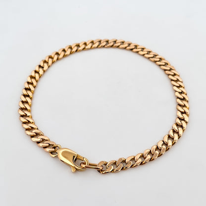 Comprar pulsera oro amarillo de 18kt con cadena tipo cubana. La pulsera mide 21,6cm de largo y 5mm de grosor. Joyas al mejor precio en Barcelona. Ian'Or.