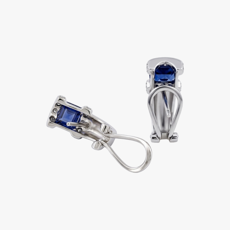 Pendientes realizados en oro blanco de 18kt con una amatista en cada pendiente talla baguette y carril de diamantes alrededor de la amatista. Ian'Or.
