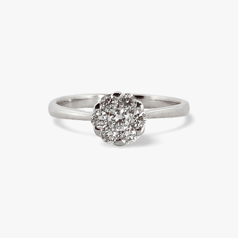 Solitario realizado en oro blanco de 18kt y flor de 7 brillantes. Joyas de segunda mano baratas. Joyería Ian'Or. Envío gratis.