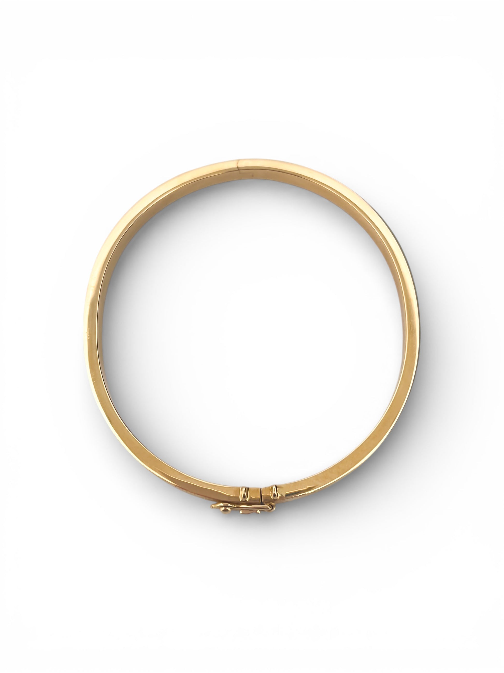 Comprar pulsera esclava de Oro amarillo de 18kt con detalles grabados. Esta preciosa pulsera rígida dispone de cierre de cajón. Esclavas de oro al mejor precio. Joyería Ian'Or.