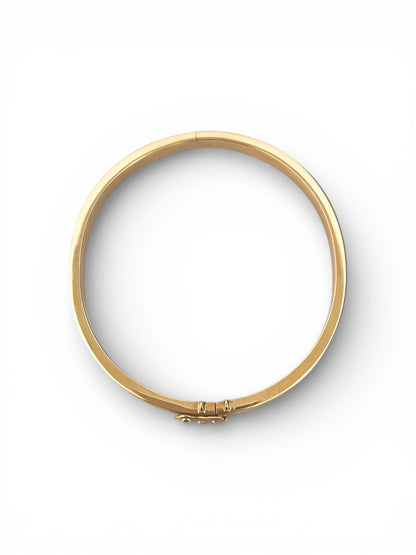 Comprar pulsera esclava de Oro amarillo de 18kt con detalles grabados. Esta preciosa pulsera rígida dispone de cierre de cajón. Esclavas de oro al mejor precio. Joyería Ian'Or.