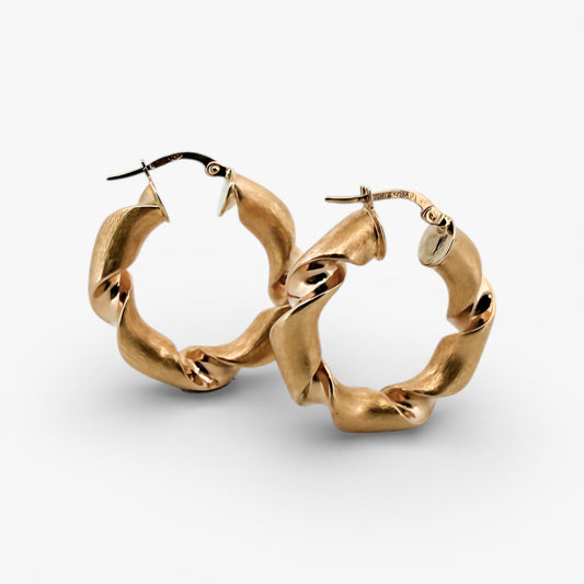 Comprar pendientes de aro tipo trenzado de oro amarillo de 18kt de 25mm de diámetro y cierre tipo criolla.Joyas de oro de 18kt. Pendientes baratos. Joyas restauradas.