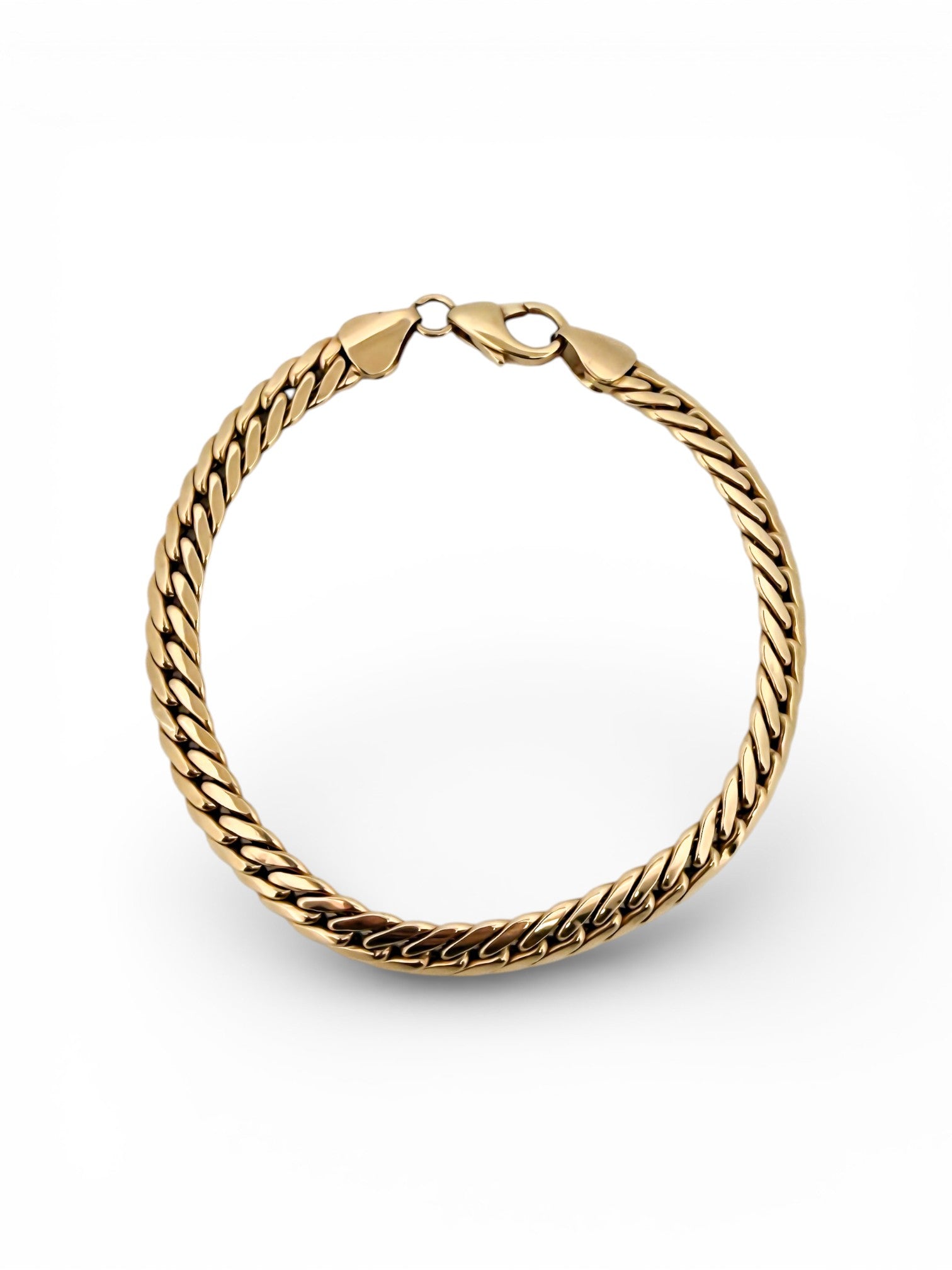 Comprar pulsera oro amarillo de 18kt con cadena tipo cubana. La pulsera mide 21
mm de largo y 6,25mm de grosor. Dispone de cierre tipo mosquetón. Joyeria Ian'Or