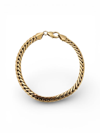 Comprar pulsera oro amarillo de 18kt con cadena tipo cubana. La pulsera mide 21
mm de largo y 6,25mm de grosor. Dispone de cierre tipo mosquetón. Joyeria Ian'Or