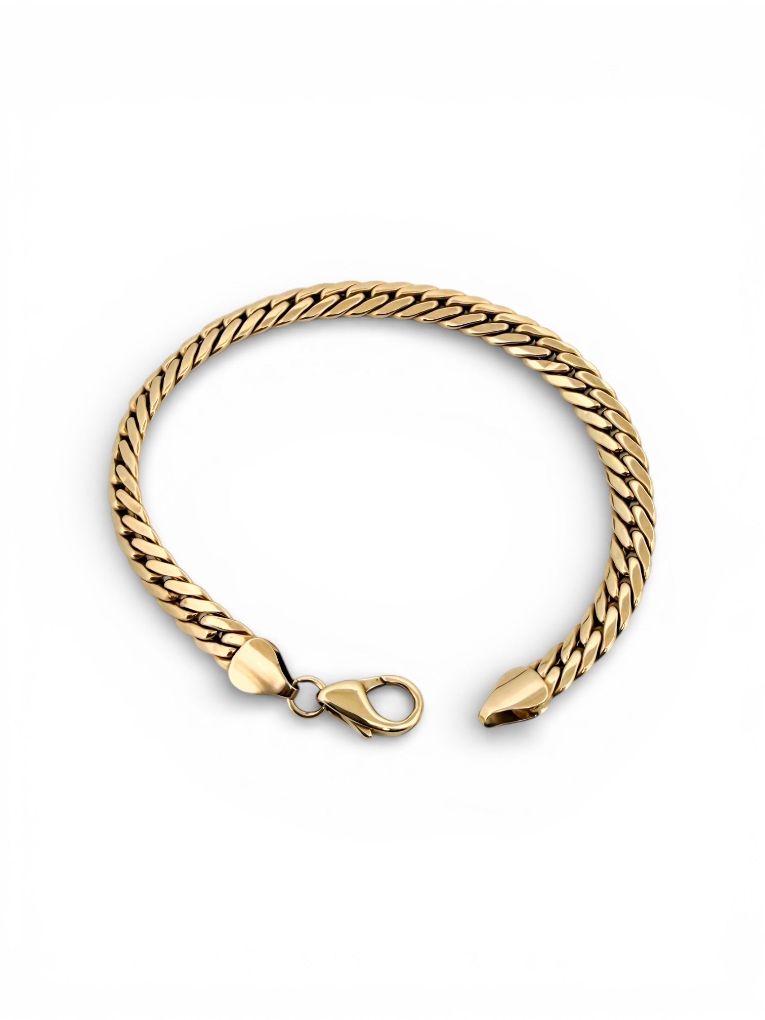 Comprar pulsera oro amarillo de 18kt con cadena tipo cubana. La pulsera mide 21
mm de largo y 6,25mm de grosor. Dispone de cierre tipo mosquetón. Joyeria Ian'Or