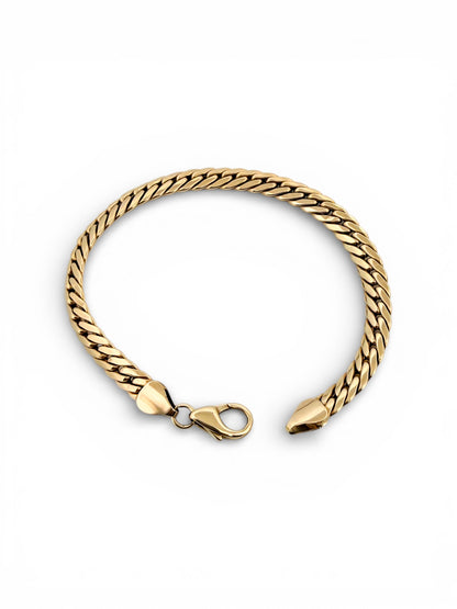 Comprar pulsera oro amarillo de 18kt con cadena tipo cubana. La pulsera mide 21
mm de largo y 6,25mm de grosor. Dispone de cierre tipo mosquetón. Joyeria Ian'Or