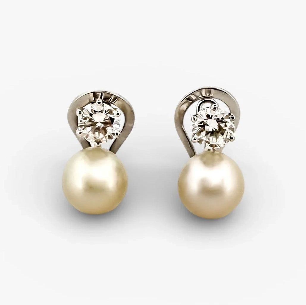 Comprar pendientes tu y yo de oro blanco de 18kt con 2 diamantes talla brillante de 0,60ct. Comprar pendientes tu y yo al mejor precio en barcelona.