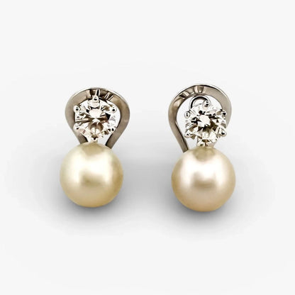 Comprar pendientes tu y yo de oro blanco de 18kt con 2 diamantes talla brillante de 0,60ct. Comprar pendientes tu y yo al mejor precio en barcelona.