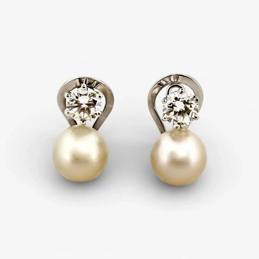 Comprar pendientes tu y yo de oro blanco de 18kt con 2 diamantes talla brillante de 0,60ct. Comprar pendientes tu y yo al mejor precio en barcelona.