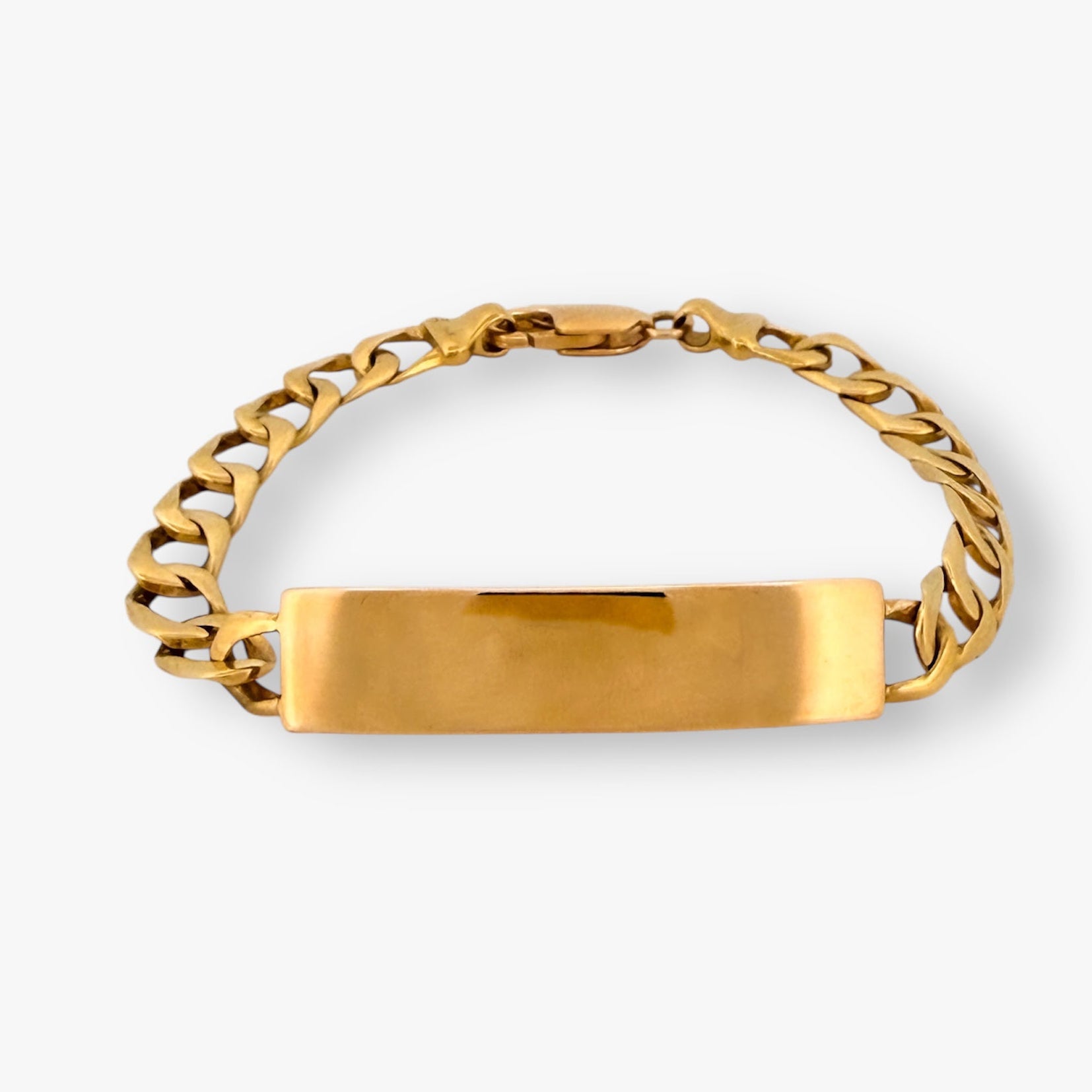 Comprar pulsera oro de 18kt con cadena tipo cubana y con una placa situada en el centro que lo convierte en un no me olvides sofisticado. Esta pulsera dispone de cierre tipo mosquetón. Joyas segunda mano. Joyería Ian'Or. Envío gratis.