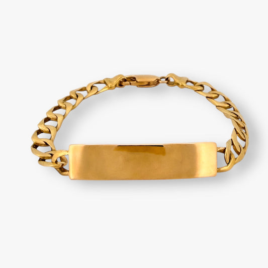 Comprar pulsera oro de 18kt con cadena tipo cubana y con una placa situada en el centro que lo convierte en un no me olvides sofisticado. Esta pulsera dispone de cierre tipo mosquetón. Joyas segunda mano. Joyería Ian'Or. Envío gratis.