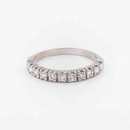 Comprar media alianza realizada en oro blanco 18kt con carril de 11 diamantes. Joyas acondicionadas. Envío GRATIS. Anillos de compromiso baratos. Ian'Or.