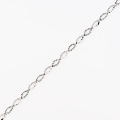 Comprar pulsera de oro blanco de 18kt con eslabones, algunos de ellos llevan diamantes. Esta pulsera dispone de cierre de cajón y brazo de seguridad. La pulsera mide 18cm. Envío gratis.