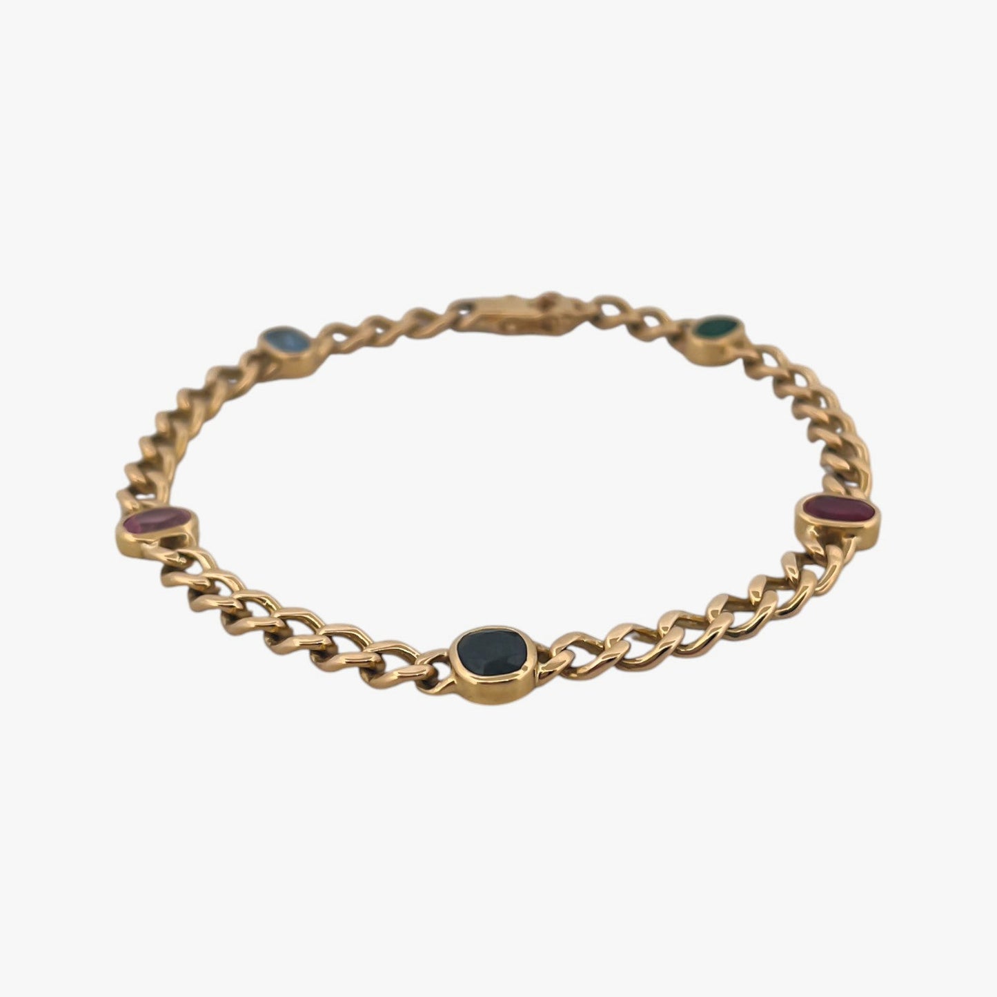 Comprar pulsera realizada oro amarillo de 18kt con cadena tipo barbada cubana y tiene 2 zafiros rosas, 1 zafiro azul y 1 topacio rosa, intercalados. Esta pulsera dispone de cierre tipo cajon con doble brazo de seguridad. Pulseras de oro 18kt baratas