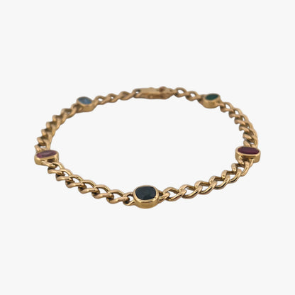 Comprar pulsera realizada oro amarillo de 18kt con cadena tipo barbada cubana y tiene 2 zafiros rosas, 1 zafiro azul y 1 topacio rosa, intercalados. Esta pulsera dispone de cierre tipo cajon con doble brazo de seguridad. Pulseras de oro 18kt baratas