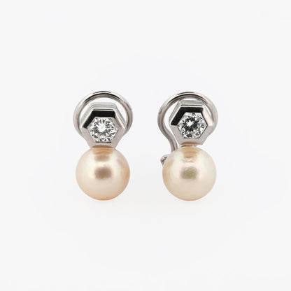 Comprar exclusivos pendientes tu y yo de oro blanco de 18k y diamantes talla brillante. Disponen de cierre Omega. Comprar pendientes tu y yo al mejor precio en barcelona.
