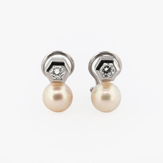 Comprar exclusivos pendientes tu y yo de oro blanco de 18k y diamantes talla brillante. Disponen de cierre Omega. Comprar pendientes tu y yo al mejor precio en barcelona.