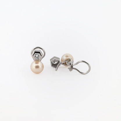 Comprar exclusivos pendientes tu y yo de oro blanco de 18k y diamantes talla brillante. Disponen de cierre Omega. Comprar pendientes tu y yo al mejor precio en barcelona.
