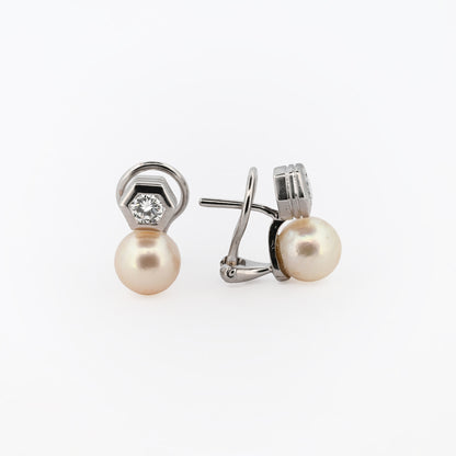 Comprar exclusivos pendientes tu y yo de oro blanco de 18k y diamantes talla brillante. Disponen de cierre Omega. Comprar pendientes tu y yo al mejor precio en barcelona.