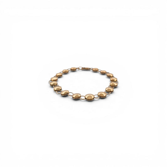 Comprar pulsera oro amarillo de 18kt con cadena de eslabones de bolitas planas. La pulsera mide 20,5cm y hace 7,77mm de grosor. Esta pulsera dispone de cierre tipo mosquetón.