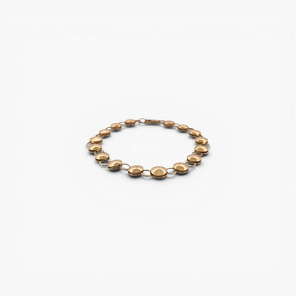 Comprar pulsera oro amarillo de 18kt con cadena de eslabones de bolitas planas. La pulsera mide 20,5cm y hace 7,77mm de grosor. Esta pulsera dispone de cierre tipo mosquetón.