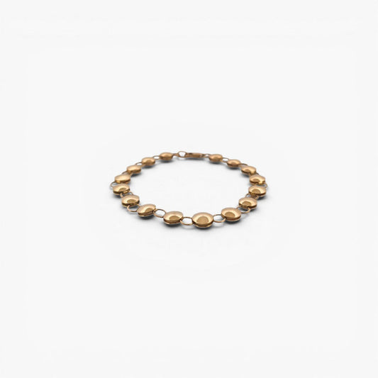 Comprar pulsera oro amarillo de 18kt con cadena de eslabones de bolitas planas. La pulsera mide 20,5cm y hace 7,77mm de grosor. Esta pulsera dispone de cierre tipo mosquetón.
