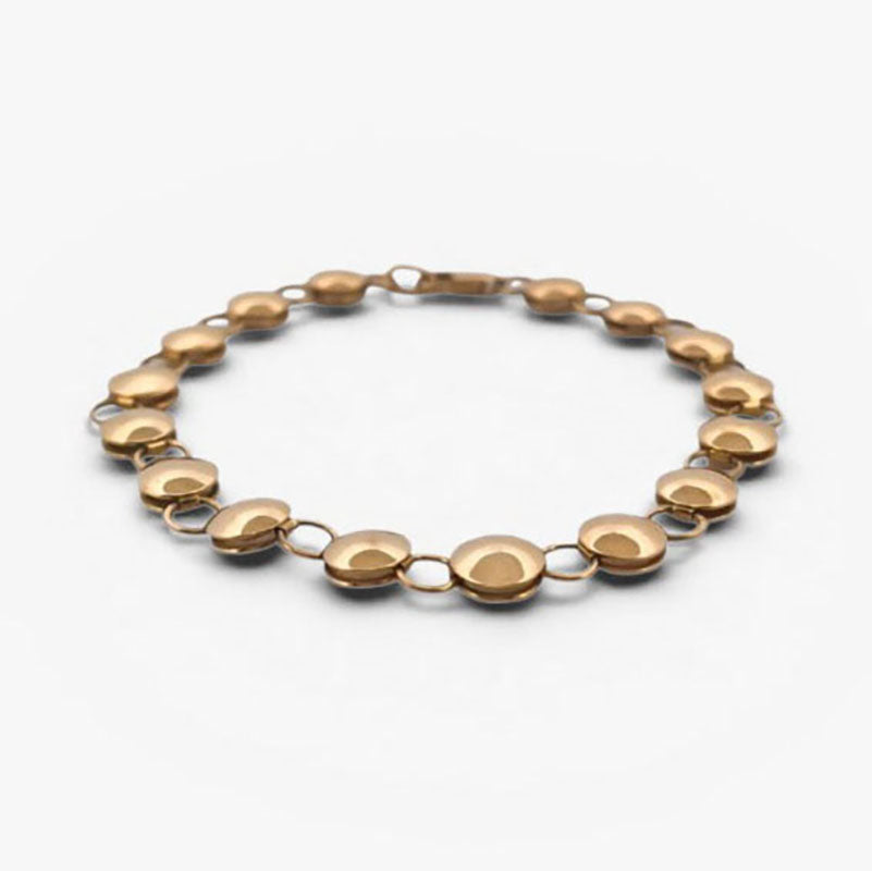 Comprar pulsera oro amarillo de 18kt con cadena de eslabones de bolitas planas. La pulsera mide 20,5cm y hace 7,77mm de grosor. Esta pulsera dispone de cierre tipo mosquetón.