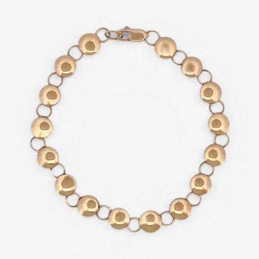 Comprar pulsera oro amarillo de 18kt con cadena de eslabones de bolitas planas. La pulsera mide 20,5cm y hace 7,77mm de grosor. Esta pulsera dispone de cierre tipo mosquetón.