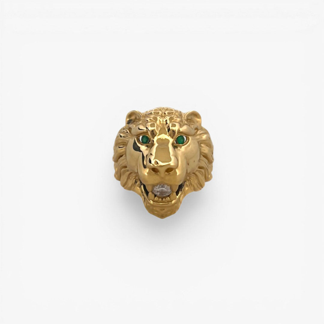 Comprar anillo de oro amarillo de 18kt en forma de cabeza de león con 2 circonitas en la parte de los ojos y 1 circonita talla brillante en la boca. Joyería compro oro mejor precio en Barcelona. Joyas de segunda mano al mejor precio. 