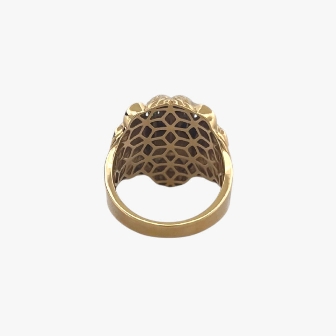 Comprar anillo de oro amarillo de 18kt en forma de cabeza de león con 2 circonitas en la parte de los ojos y 1 circonita talla brillante en la boca. Joyería compro oro mejor precio en Barcelona. Joyas de segunda mano al mejor precio. 