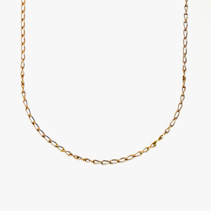 Comprar collar de oro de amarillo de 18kt con cadena barbada con eslabón alargado. Medidas: 55,5cm de largo x 2,41mm grosor. Cadenas de oro de 18kt baratas.