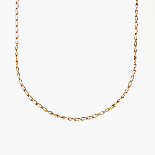 Comprar collar de oro de amarillo de 18kt con cadena barbada con eslabón alargado. Medidas: 55,5cm de largo x 2,41mm grosor. Cadenas de oro de 18kt baratas.