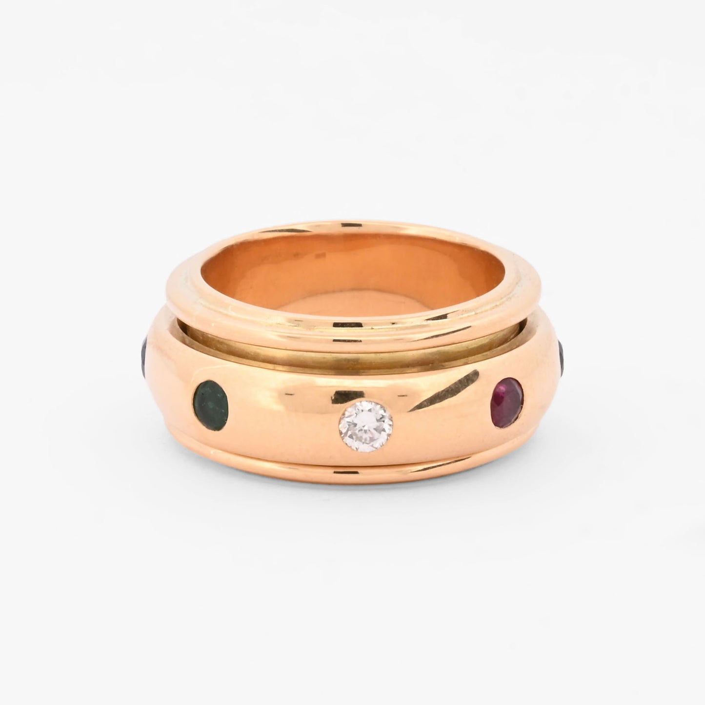 Anillo giratorio Piage de oro amarillo 18kt con piedras preciosas y diamantes. Pieza certificada y envío gratuito. Ian'or barcelona. Comprar joyas. Barcelona.