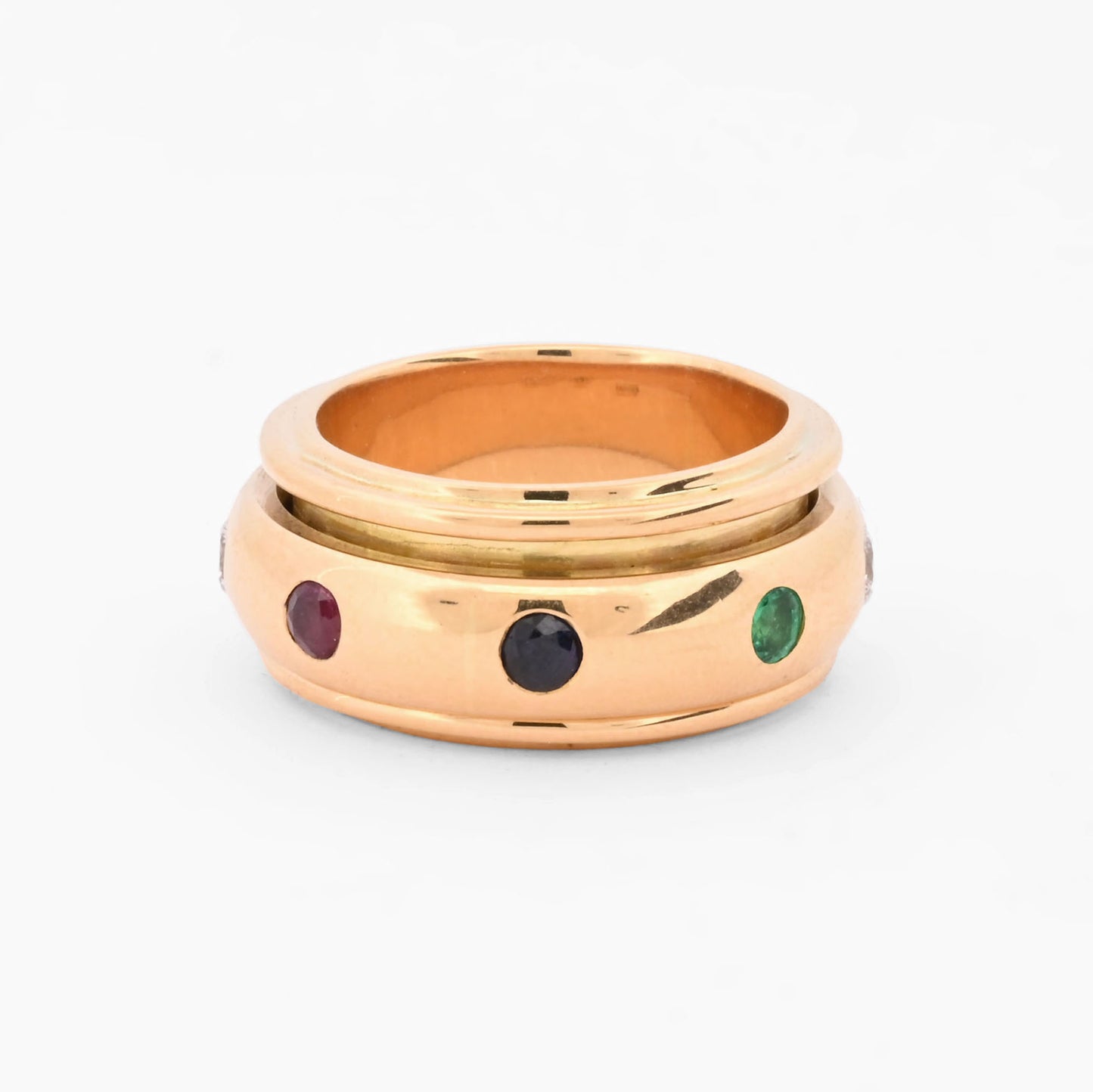 Anillo giratorio Piage de oro amarillo 18kt con piedras preciosas y diamantes. Pieza certificada y envío gratuito. Ian'or barcelona. Comprar joyas. Barcelona.