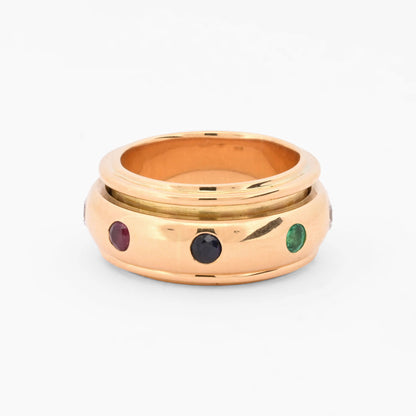 Anillo giratorio Piage de oro amarillo 18kt con piedras preciosas y diamantes. Pieza certificada y envío gratuito. Ian'or barcelona. Comprar joyas. Barcelona.